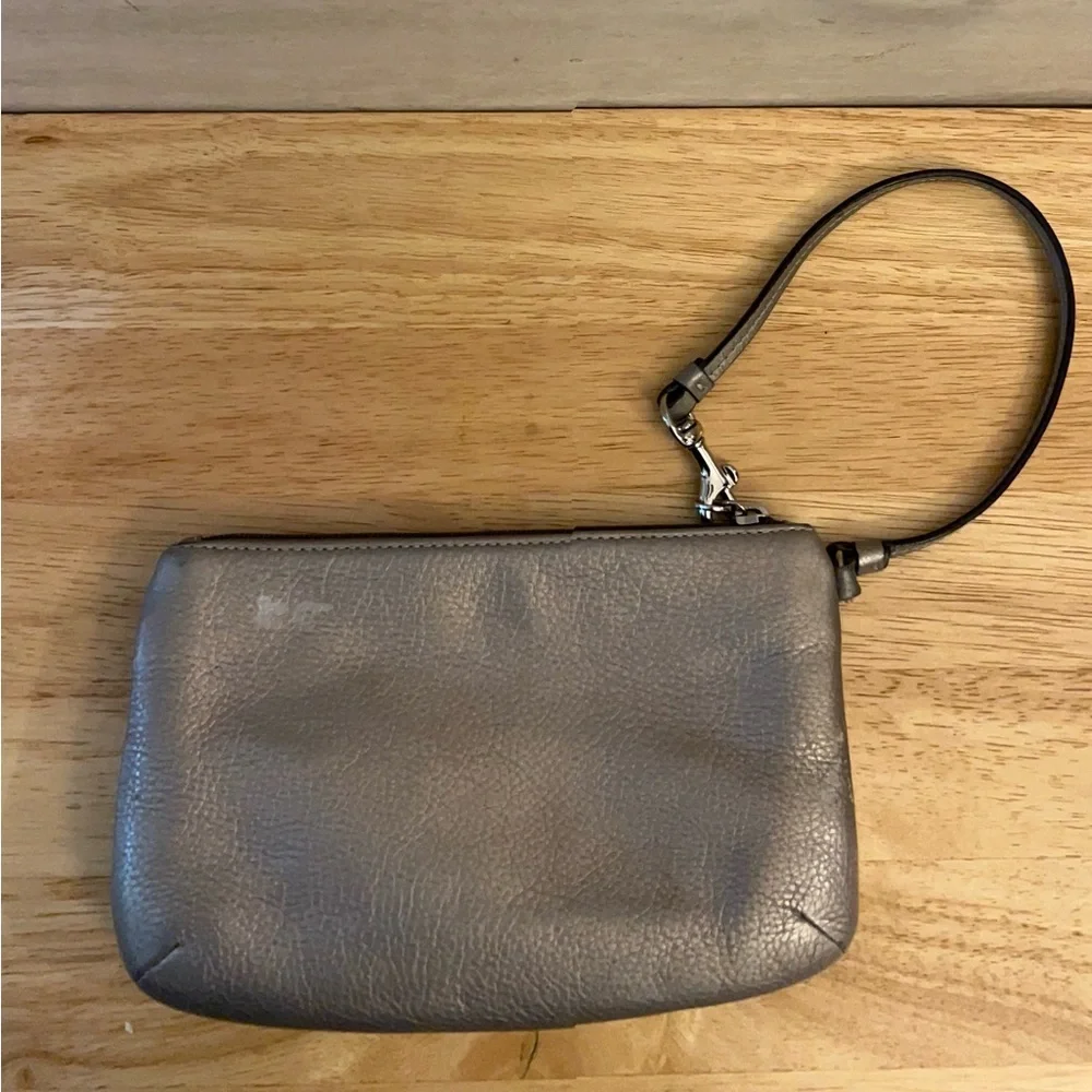 Coach metallic leather wristlet clutch purse.